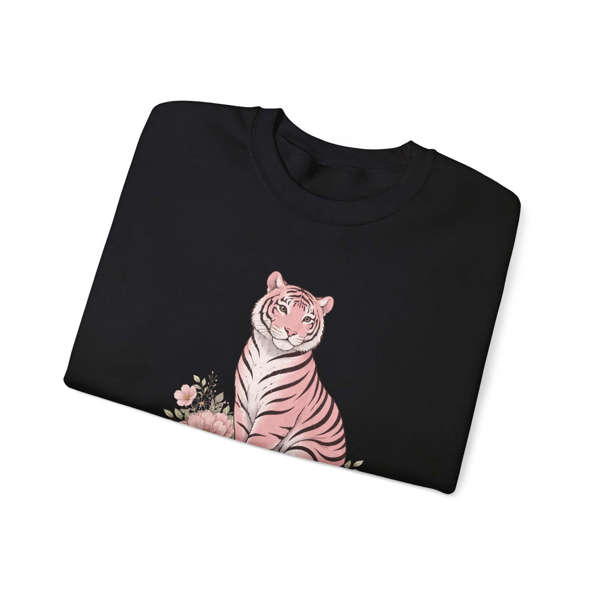 Folded cozy unisex sweatshirt featuring a pink tiger sitting among pastel flowers