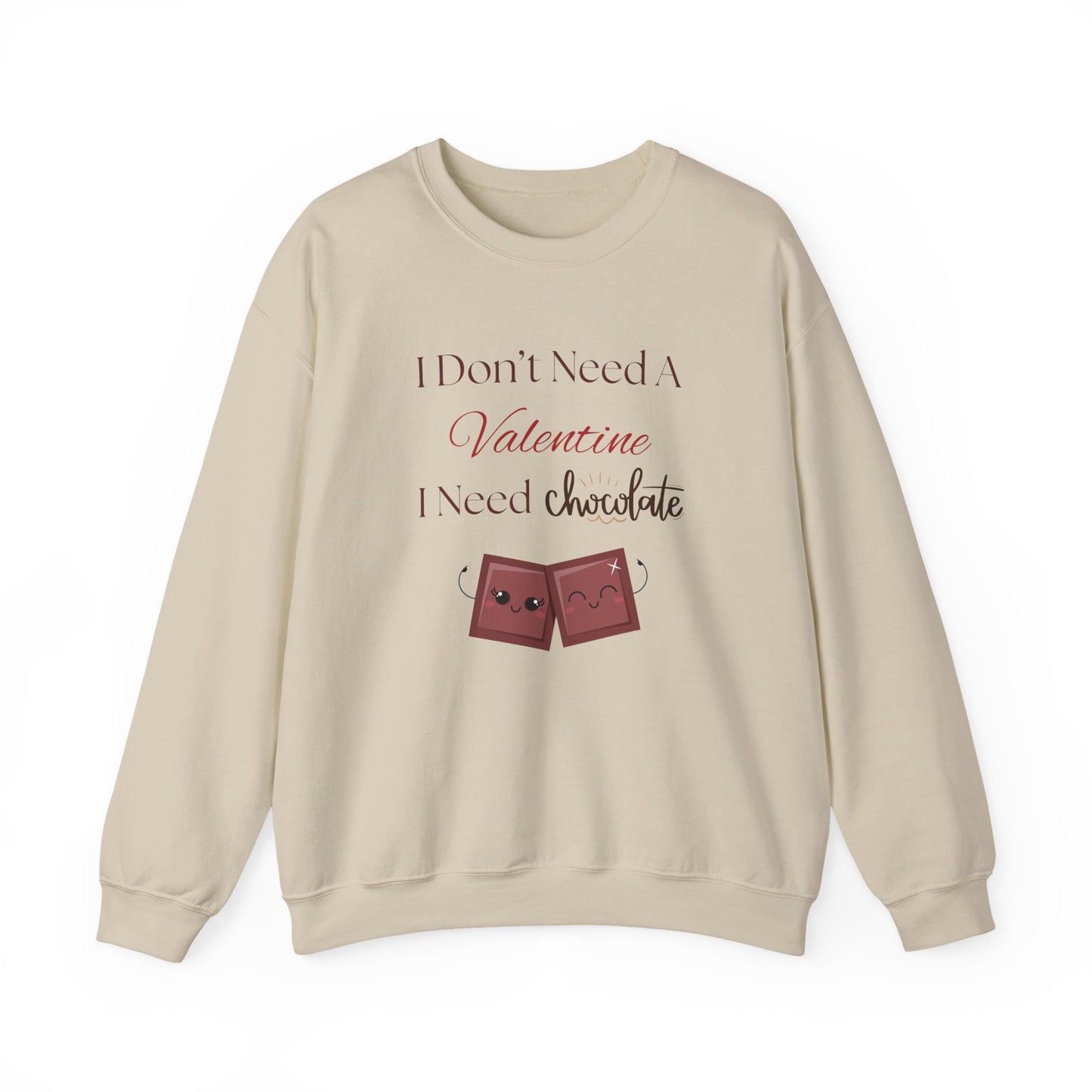 A tan Valentine’s sweatshirt with the phrase “I Don’t Need a Valentine, I Need Chocolate” and two cute smiling chocolate characters on the front.