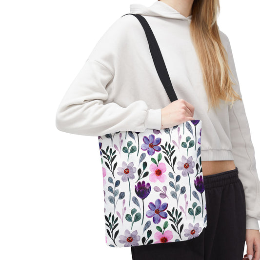 Floral tote bag with a colorful botanical flower pattern, worn over the shoulder for everyday use