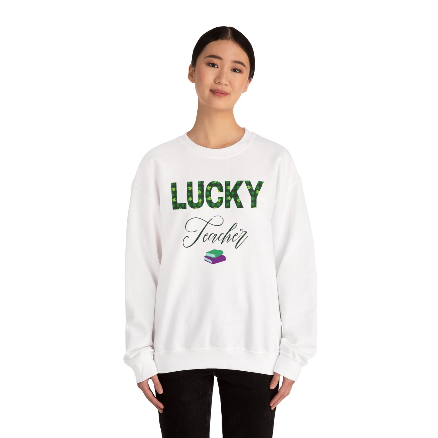 Model wearing a white Lucky Teacher sweatshirt with green clover lettering and book icon.
