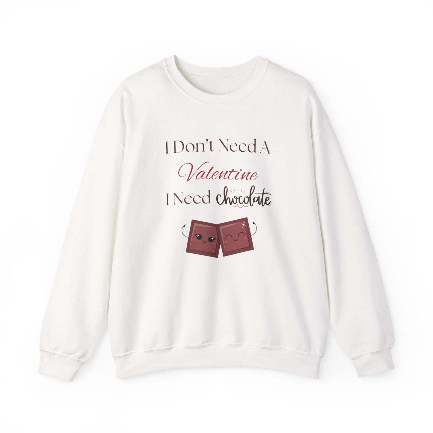 A white Valentine’s sweatshirt with the phrase “I Don’t Need a Valentine, I Need Chocolate” and two cute smiling chocolate characters on the front.