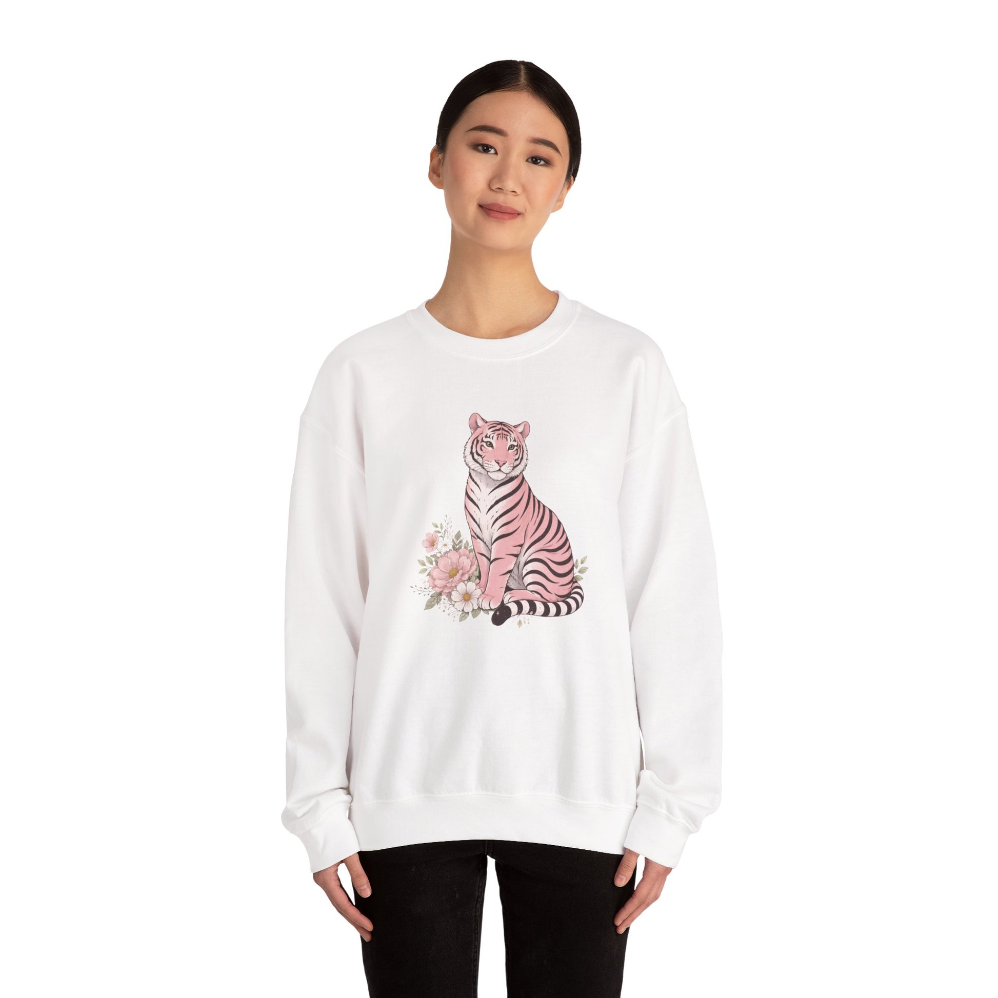 A cozy unisex sweatshirt featuring a pink tiger sitting among pastel flowers