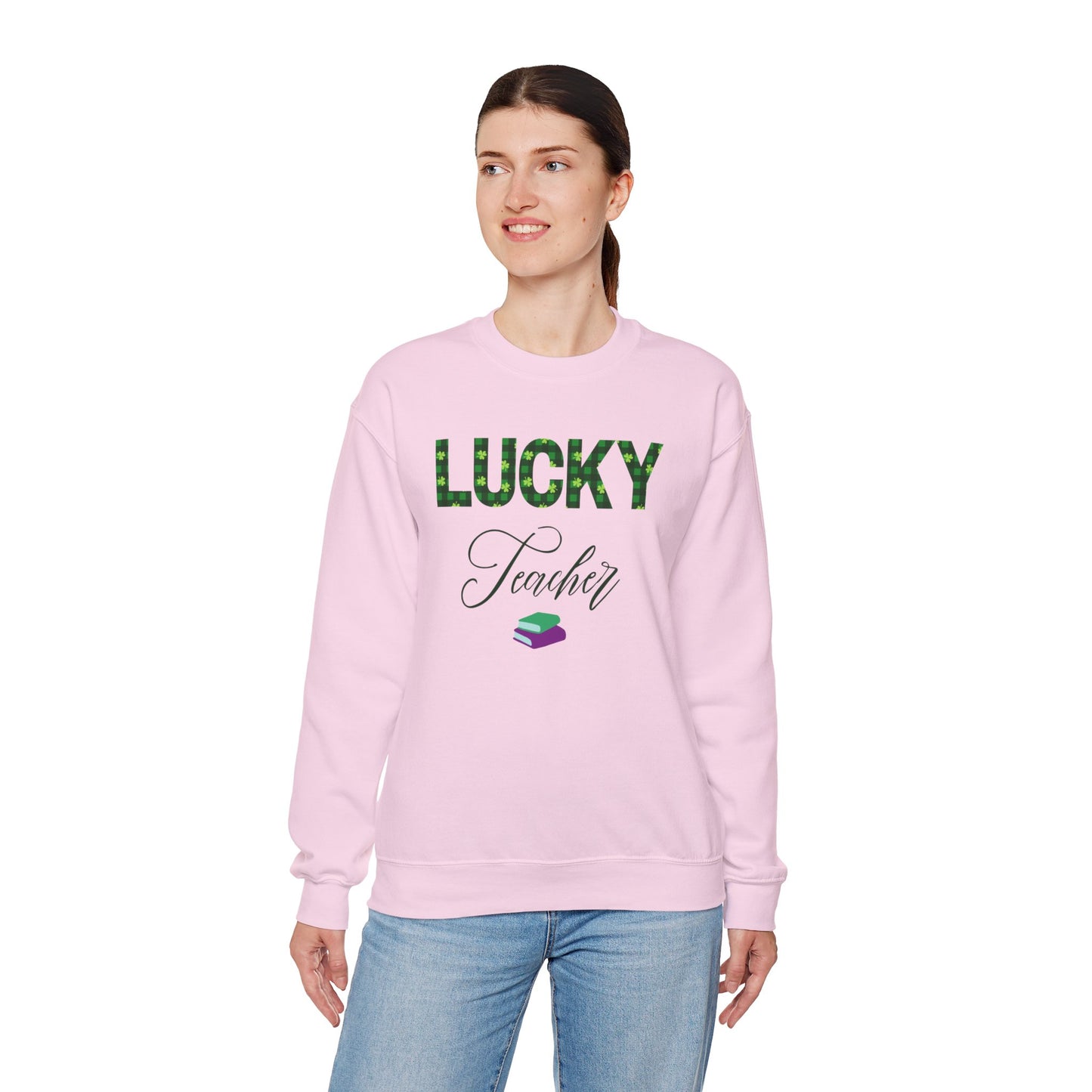 Model wearing Lucky Teacher sweatshirt with green clover lettering and book icon.